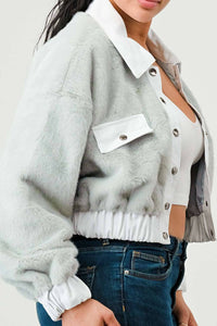 Layered look with a cropped faux fur and denim jacket over a white tank top