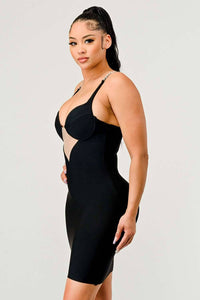 Black Dress with Sheer V Cut-Out and Chain Straps: A stylish black bodycon dress with a plunging neckline and a sheer V-shaped cut-out. The chain straps add a luxurious touch, ideal for evening wear.