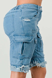 Light Blue Cargo Denim Shorts: A pair of light blue Bermuda shorts made from denim, designed with cargo pockets and distressed details. The rolled hem adds a trendy, casual touch.