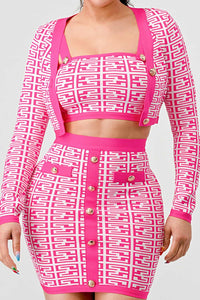 Pink and White Graphic Print Two-Piece Set: A striking two-piece set with a pink and white geometric print. The long-sleeve crop top and high-waisted skirt are both detailed with gold buttons.