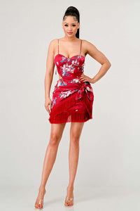 Red kimono-inspired floral print mini dress with playful tassel hem detail