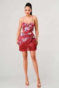 Elegant red floral dress with side cut-out and adjustable strap features