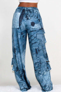 Comfortable and stylish wide-leg cargo pants with a unique tie dye design and elastic high waist, suitable for diverse body types.