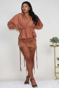 Desert Rose: Cinched Waist Windbreaker and Tassel Skirt SetEmbrace the effortless chic of our Desert Rose Windbreaker and Tassel Skirt Set, a harmonious blend of adventurous spirit and contemporary style. This set is a tribute to the free-spirited and bold, crafted for those who carry the essence of the desert rose within them.