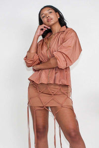 Desert Rose: Cinched Waist Windbreaker and Tassel Skirt Set - ATHINA