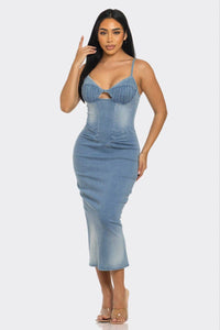 Fashionable blue denim dress with thin straps and front cutout