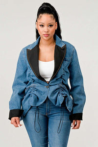 Blue denim jacket with black lapel and cinched waist design