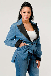 Stylish denim blazer with black lapel and gathered waist