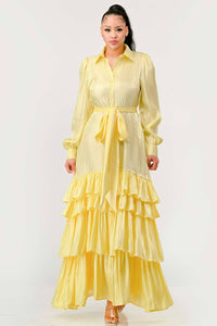 Elegant Yellow Ruffled Maxi Dress: This elegant yellow maxi dress is designed with tiered ruffles on the skirt, long puff sleeves, and a collared neckline. The dress includes a fabric belt to cinch the waist.