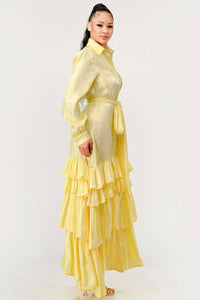 Yellow Collared Maxi Dress with Ruffles: A sophisticated yellow dress with a button-up front, tiered ruffle layers, and a fabric belt. The dress has long sleeves and a collared neckline for a classic look.