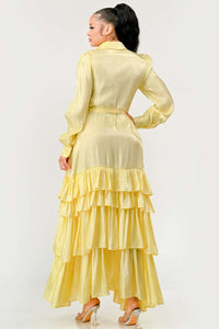 Yellow Long Sleeve Dress with Tiered Skirt: This yellow maxi dress features long puff sleeves, a tiered ruffle skirt, and a collared neckline. The button-up front and waist tie add a touch of elegance.