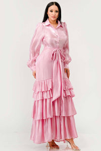 Pink Tiered Ruffle Maxi Dress with Belt: A long pink dress featuring a button-up front, tiered ruffle skirt, and a matching fabric belt at the waist. The dress has long, puffed sleeves and a collared neckline.