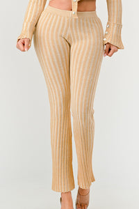  A fashionable ribbed knitwear set in beige, featuring a cropped cardigan and high-rise flared pants.