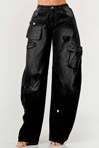 Stylish black wide-leg jeans with cargo pockets and distressed patches