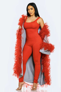 A fusion of fire and sky in fashion, with red form-fitting jumpsuit and airy azure sleeves with red accents.