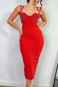 Elegant Red Dress with Gold Embellished Bust: This elegant red dress showcases a bodycon fit with gold studded detailing on the bust. The dress includes double shoulder straps and side cut-outs for a sophisticated style.